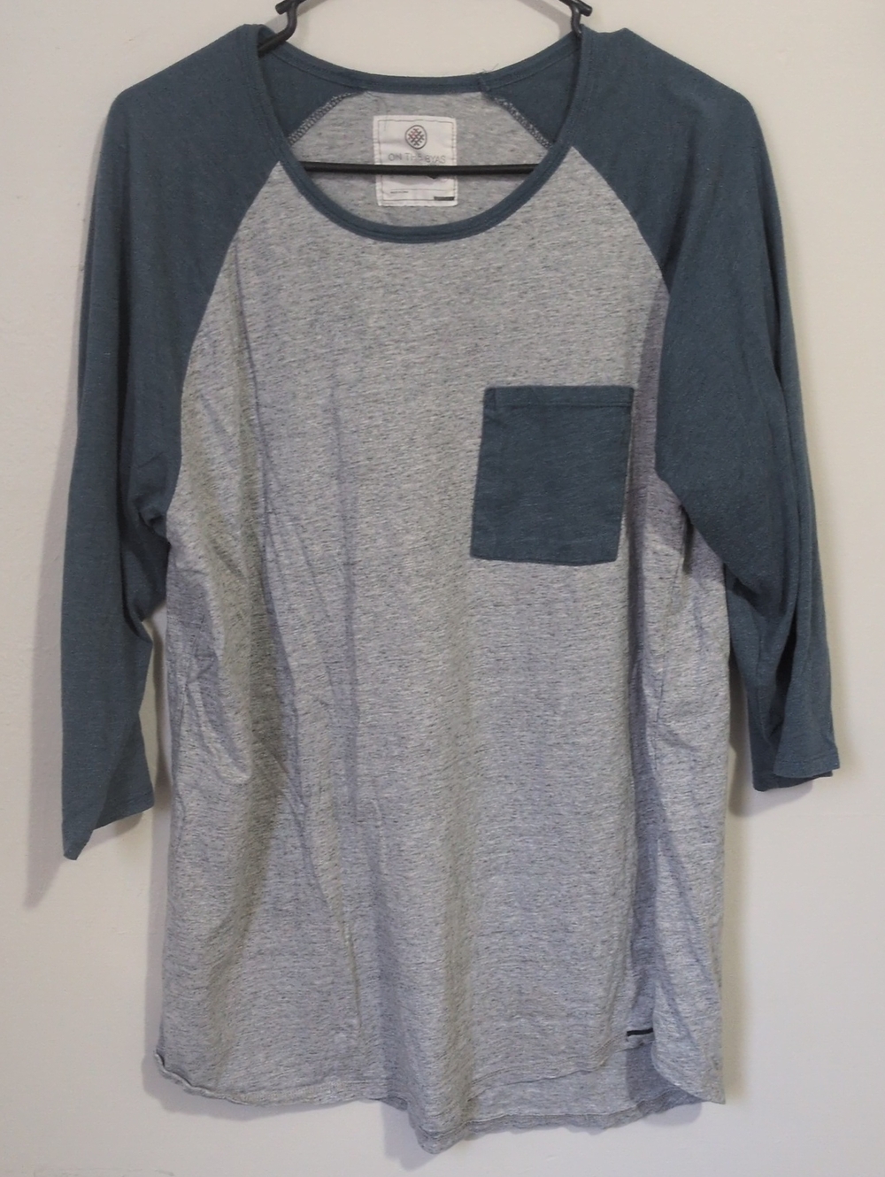 on the byas Heather Gray Raglan Tee with Teal Sleeves & Pocket